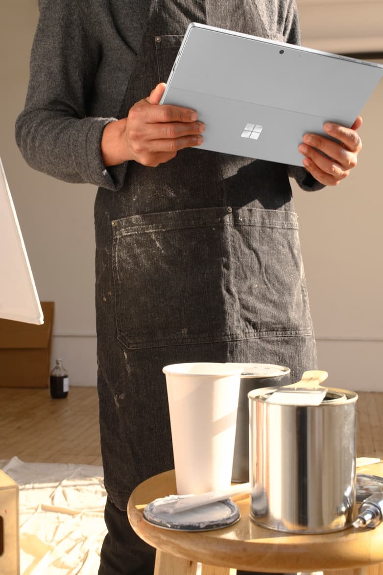 artist painting in studio